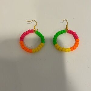 Pink, yellow, green, and orange hoop earrings
